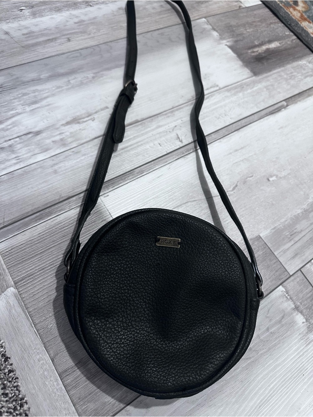 Roxy Black Pebbled Round Crossbody Bag
